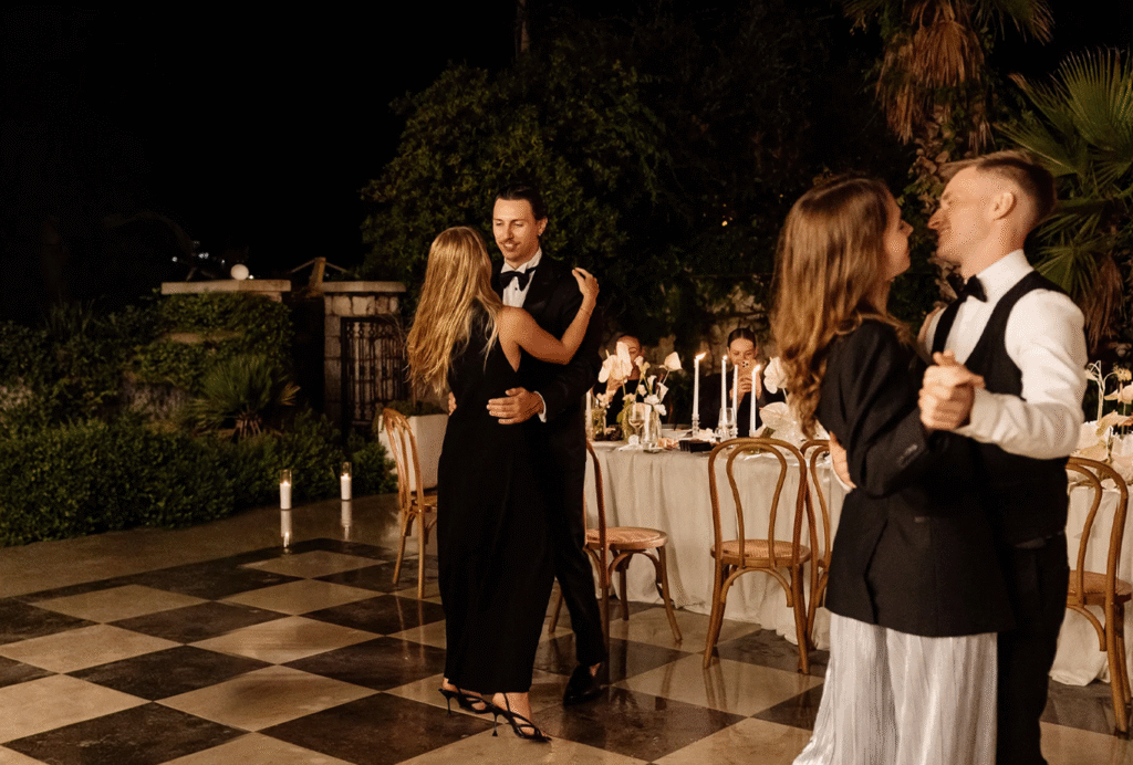 Guests dancing during an evening wedding reception at Villa Shah