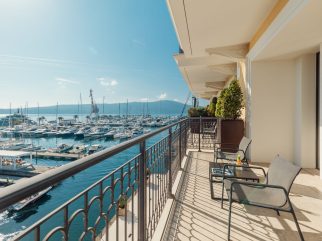 Private terrace overlooking Porto Montenegro marina and Boka Bay from Regent Porto Montenegro suite.