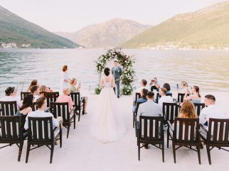 Wedding ceremony by the water at Adriatica Restaurant & Beach Club in Kamenari, Boka Bay, Montenegro.